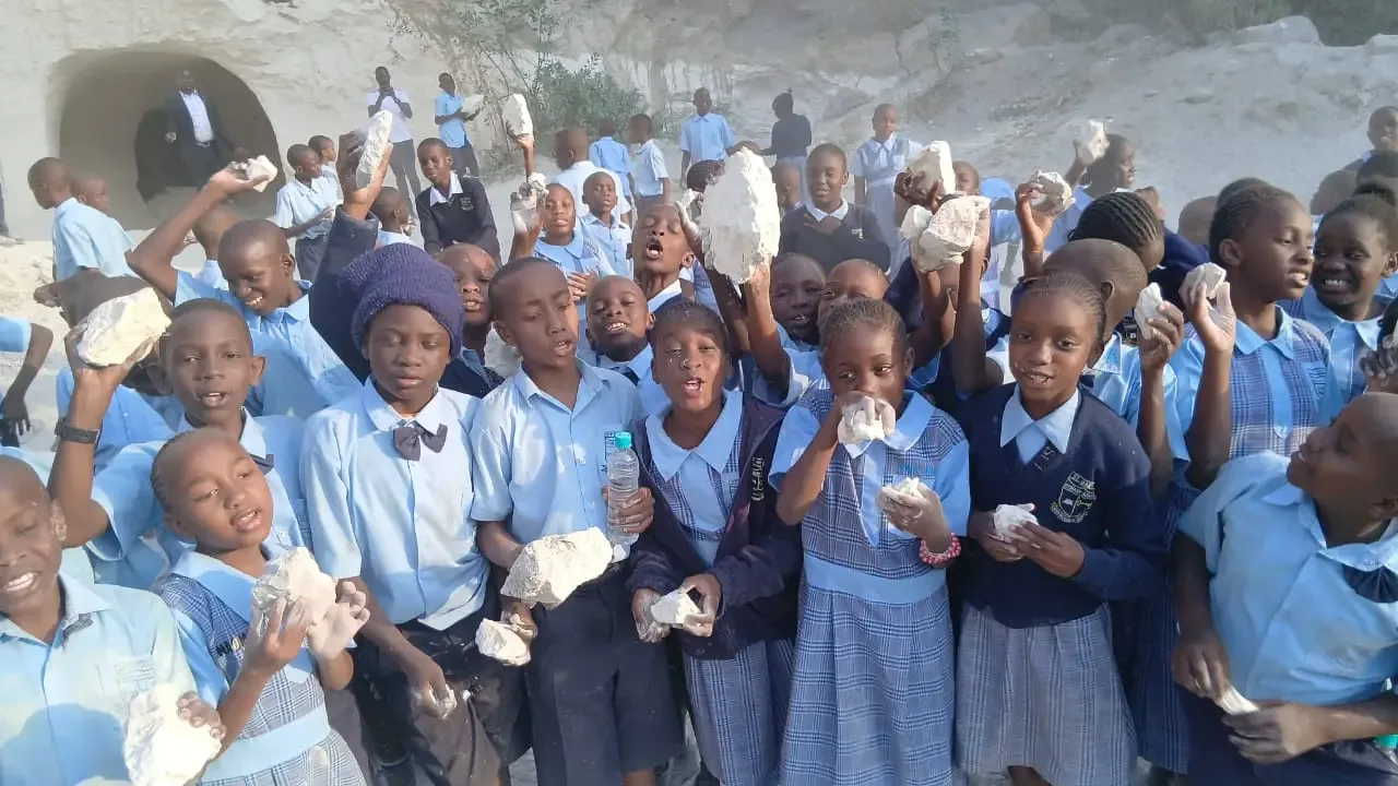 A group of learners exploring rock formations